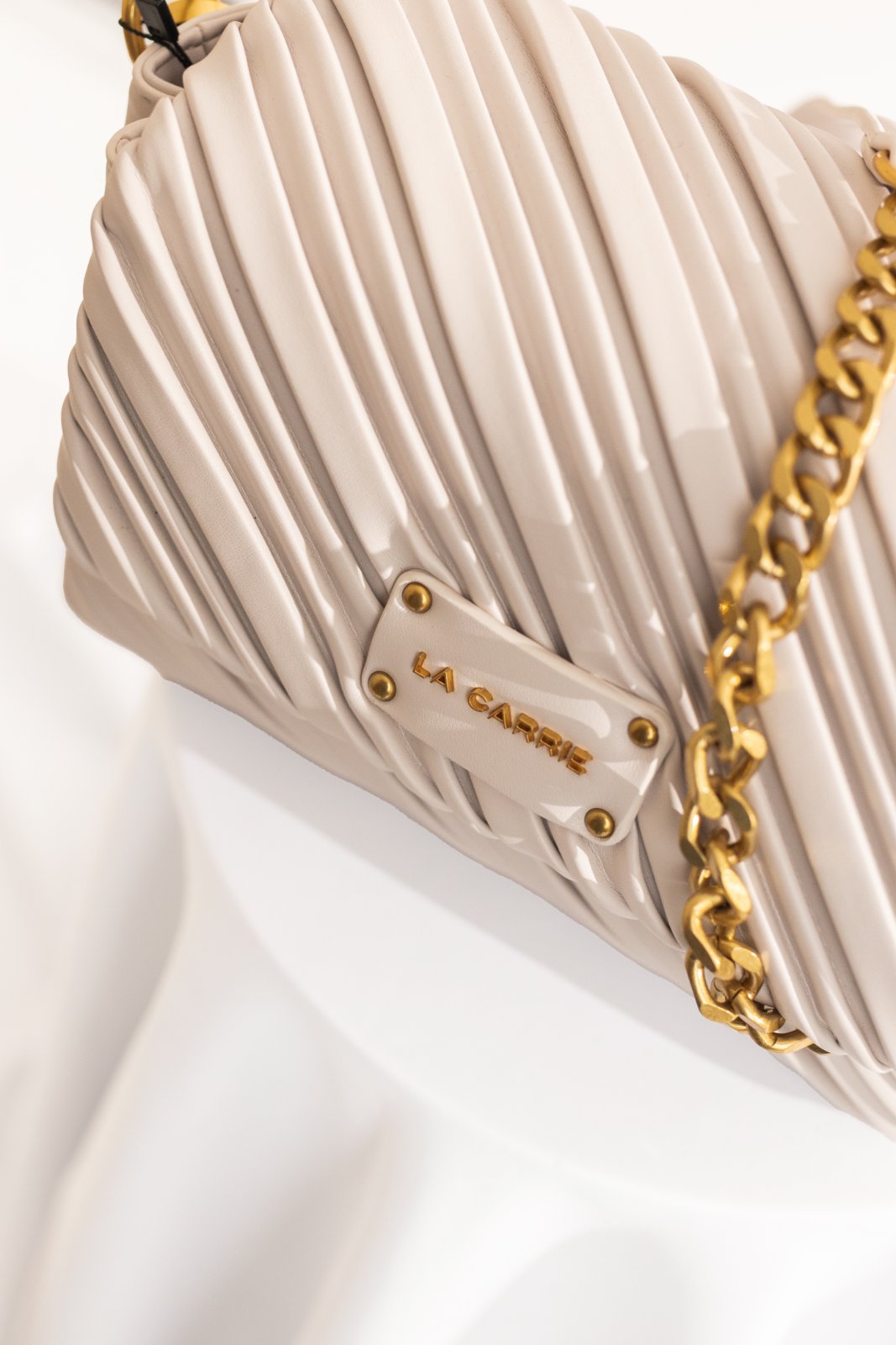 Crossbody drapeada